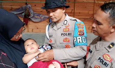 Tim Dokkes Polres Aceh Tengah dan Brimob Tangani Bayi Sakit di Desa Terisolir Kecamatan Bintang