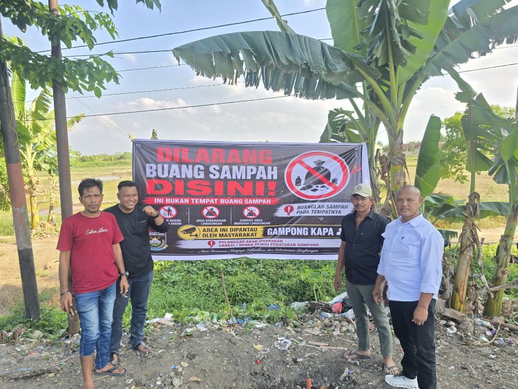 Geuchik Gampong Kapa Pasang Banner Larangan Buang Sampah di Jalur Nasional, Danton Siapkan Hadiah bagi Pelapor
