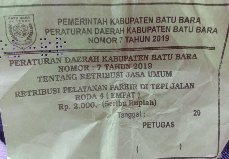 Beredar Karcis Retribusi Parkir Rp.2.000" Tanpa Nama, Tanda tangan dan Stempel dihalaman Bank BRI Desa Pakam