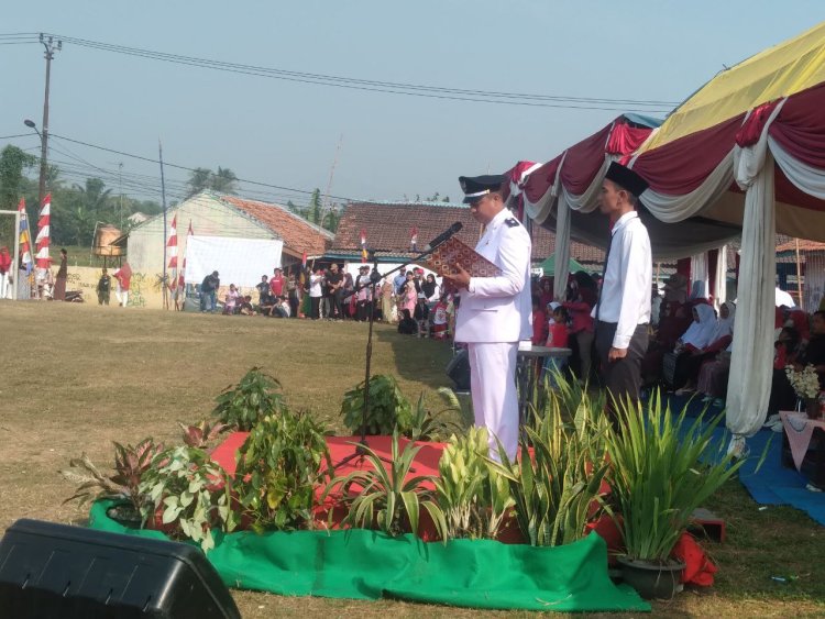Kades Mekar Jaya Pimpin Upacara Pengibaran Sang Saka Bendera Merah Putih HUT Ke 78 Kemerdekaan RI   