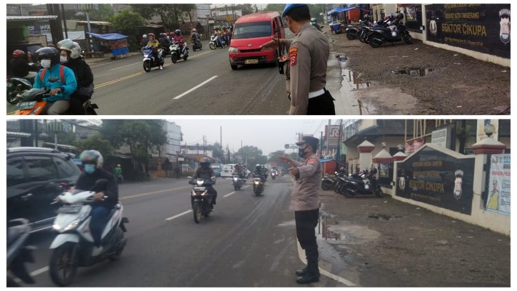Urai Kemacetan Kanit Propam Dan Kanit Patroli, Lantas Lakukan Pengaturan Kalulintas Di Pertigaan Kolombus Depan Komando Cikupa