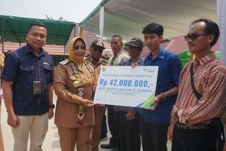 Bupati Mempawah beserta Wakil Bupati Mempawah menghadiri gema bina bangun desa di SMP Negeri 03 Toho
