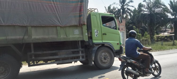 Beranikah Pemda Jambi dan Polda Jambi Menindak Angkutan Batubara yang Eksis di jalan Lintas Timur Tanjab Barat